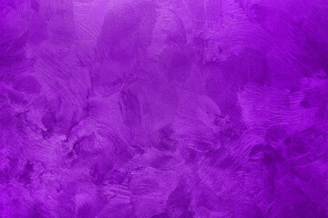 Abstract background of textured wall of purple color.