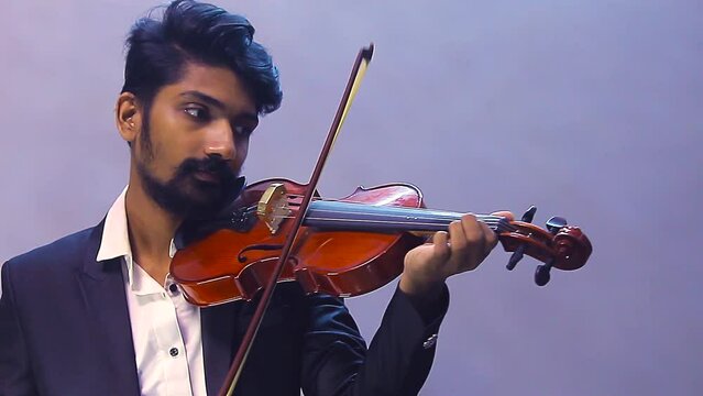 man playing violin video