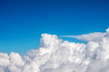 White clouds in blue sky.