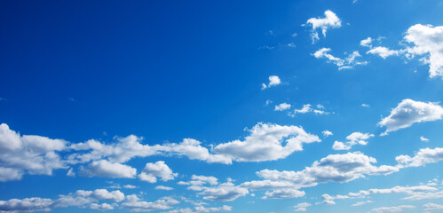 White clouds in blue sky.