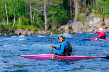 Team training kayaker, woman on kayak boat. Concept extreme water sport