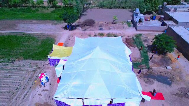 wedding marquee decoration in field aerial view country side celebrations tent setting