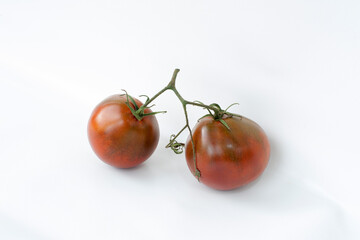 Red tomatoes on an isolated background