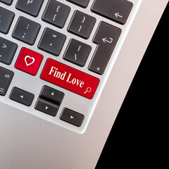 Computer key with love shape and the words find love.