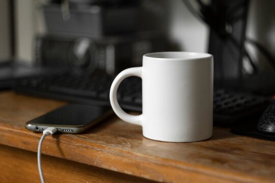 White mug on the desktop