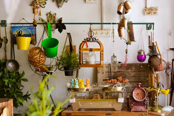 Colorful vintage item on the with a bell background of a light blue door in the old city of Safed. In Israel in a spectacular antique store