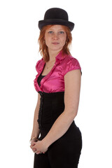 Pretty redhear girl in a pink blouse with a bowler isolated on transparent background