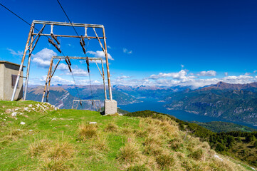 Fototapeta na wymiar Panorama on Lake Como, with the ski lifts closed, present on Monte San Primo. 
