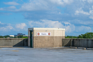 Fototapeta premium Stairwell at the top floor of a parking garage in Uptown New Orleans, Louisiana, USA