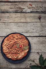 Apple pie on a rough table