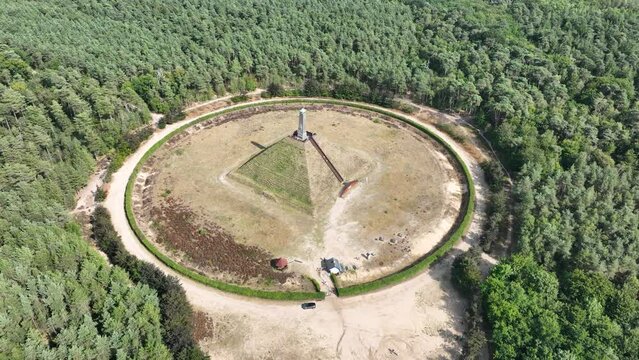 The Pyramid of Austerlitz monument consisting of a grass clad pyramid shaped sand mound stone obelisk. Utrecht municipality of Woudenberg. Aerail drone overview panorma platform.