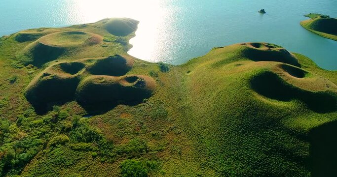 Huge cones of pseudo craters on the Icelandic shore.