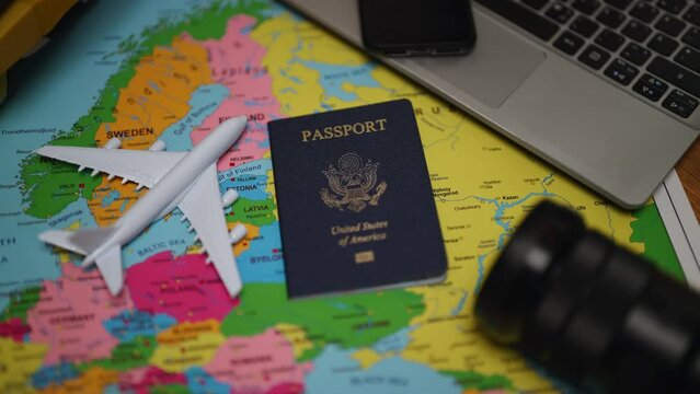 United States of America passport on Europe map. Travel concept.