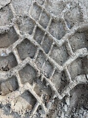  Reifenabdruck im Sand