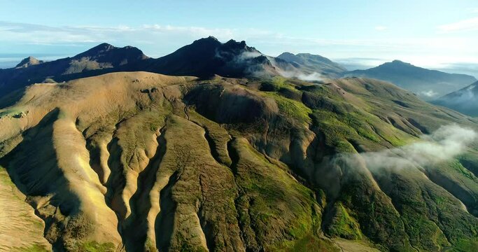 Beautiful mountain landscape of high green mountains in Iceland.