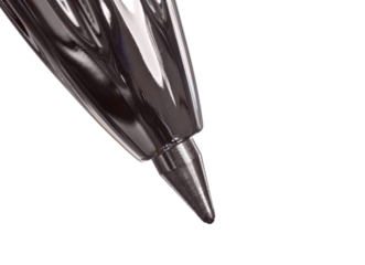 Macro of a ball point pen tip isolated.