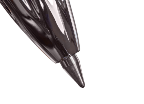 Macro of a ball point pen tip isolated.