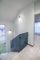 Modern home interior with the hallway and stairs