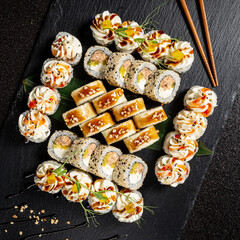 tasty sushi on the black background