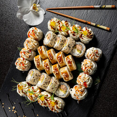 tasty sushi on the black background