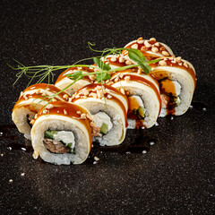 tasty sushi on the black background