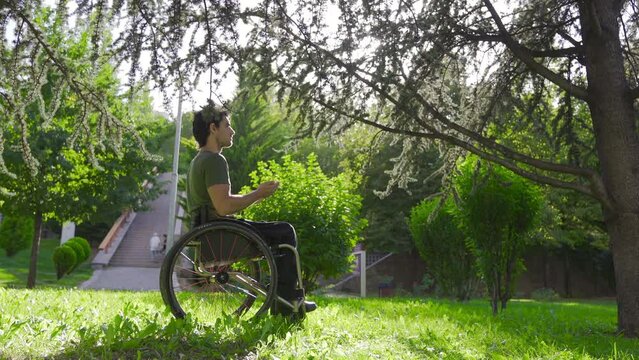 Prayer. Young disabled man praying for healing.
Prayer. Young disabled person sitting in wheelchair praying.
