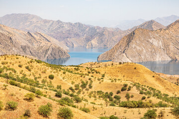Nurek, Khatlon Province, Tajikistan. Nurek Reservoir on the Kyzylsu River. - obrazy, fototapety, plakaty