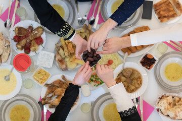 Top view of muslim family having Iftar during Ramadan holy month