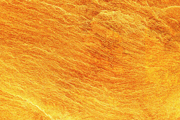 Gold stone texture for background. gold background