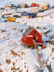 Poster Town Uummannaq during winter in northern West Greenland beyond the Arctic Circle. Greenland, Danish territory © Danita Delimont