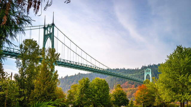 Autumn landscape of St. John's Bridge over Cathedral City Park in Portland. St. John's Bridge over Willamette River, viewed from Cathedral City Park in Portland, Oregon State.