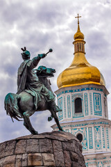 Fototapeta na wymiar Bohdan Khmelnytsky equestrian statue, Saint Sophia, Sofiyskaya Square, Kiev, Ukraine. Founder of Ukraine Cossack State in 1654. Statue created 1881 by Sculptor Mikhail Mykeshin