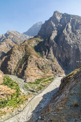 Fototapeta na wymiar Yakhchi Pun, Gorno-Badakhshan Autonomous Province, Tajikistan. The canyon of the Panj River in rugged mountains on the border of Afghanistan and Tajikistan.