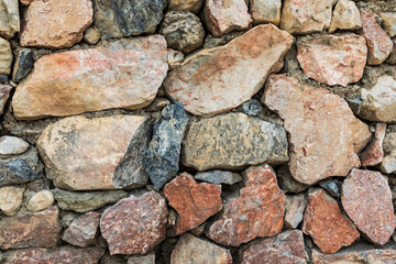 Anzob, Sughd Province, Tajikistan. Stone wall in a mountain village.