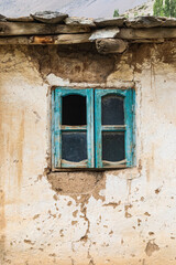 Fototapeta na wymiar Margib, Sughd Province, Tajikistan. Window on a traditional home in a mountain village.
