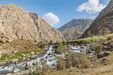 Fototapeta na wymiar Haft Kul, Sughd Province, Tajikistan. Mountain stream in the Haft Kul, Seven Lakes, region.