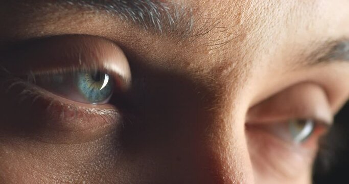 Woman, eyes and looking forward with vision, sight and reflection on the past, future or memories. Zoom, human face closeup and detail of natural contacts from an optician or fashionable blue lenses