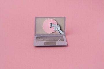 Laptop with a megaphone.