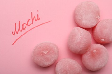 Flat lay composition with delicious mochi on pink background. Traditional Japanese dessert