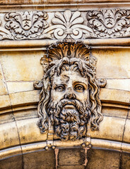 Ancient Old Man Beard Statue decoration, Stone Bridge, Paris, France.