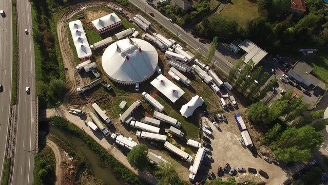 Big Top of a Circus with Caravans in a Field Aerial View