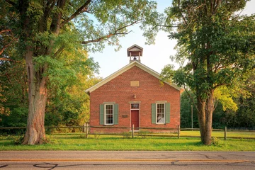 Fotobehang Exterior of old brick one room schoolhouse in Ohio horizontal © Lenspiration