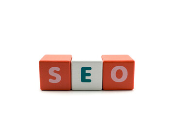 Word Search Engine Optimization SEO written on wooden cubes