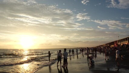 FUJISAWA, KANAGAWA, JAPAN - AUGUST 2022 : View of Enoshima beach (sea) at Shonan area in sunset. Time lapse shot, dusk to night. Japanese hot summer holiday (vacation) season concept video.