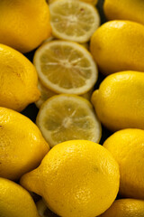 lemons and lemon slices, used to create savory dishes, lemonade, lemon desserts, lemon water