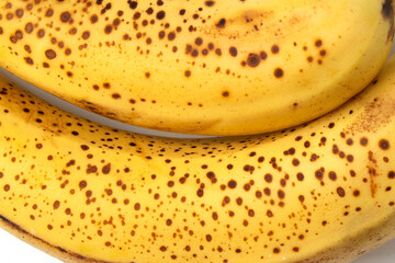 Yellow color, banana texture - micro image. Texture of ripe organic banana closeup