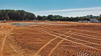 Fotobehang commercial grading and land development on work site © swayactionhero