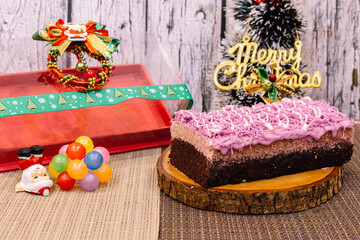 Taro cake with candles and flowers