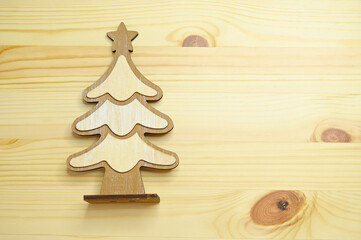 wooden christmas tree on table, celebration design