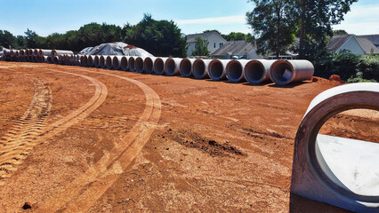 utility pipes for site works on grading project
